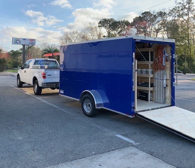 Completely stocked truck and trailer prepared to tackle any complex replacement job.